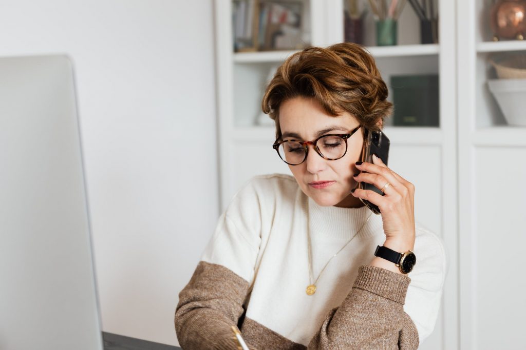 Woman talking with previous clients.